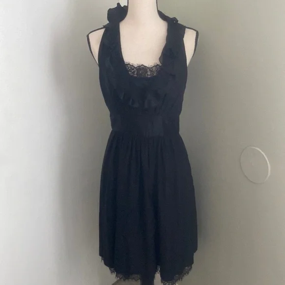 white house black market black ruffle dress Satin and flattering ruffled tiers throughout White House Black Market Black